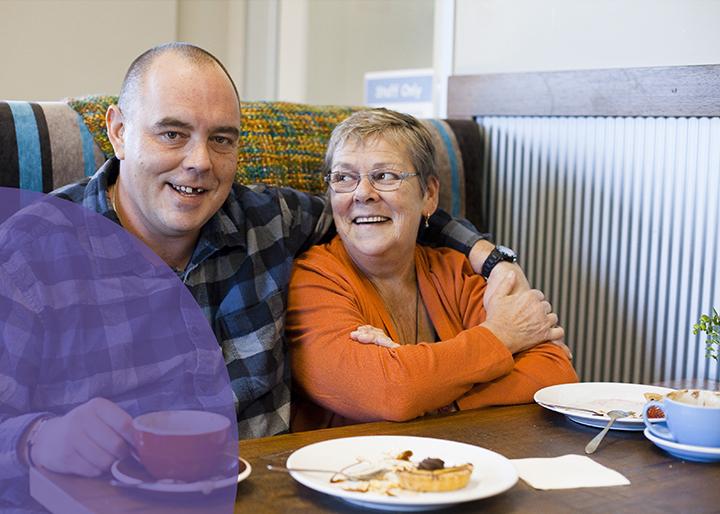 A man and a woman eating
