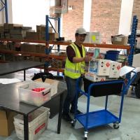 Man pushing a trolley